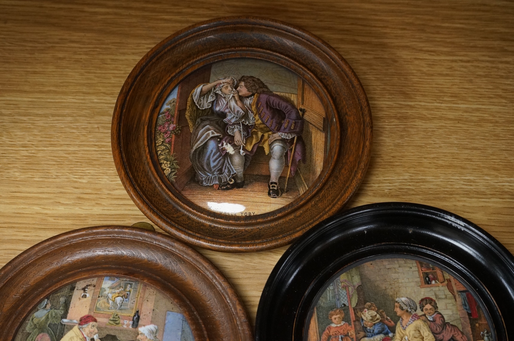 A collection of eleven framed pot lids, including one of the Chrystal Palace; The Grand International Building of 1851, For The Exhibition of Art and Industry of all Nations, Crystal Palace pot lid 12.5cm diameter not in